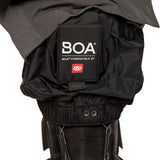The black 686 Quantum Thermagraph Pants from the back view show a BOA dial on the side and an insulated hood.