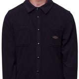 The 686 Sierra Fleece Flannel 2024 is depicted in a black front view, showcasing its classic button-down collar and cuffs.