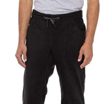 The 686 brand's Smarty 3-in-1 Cargo Pant features black cargo pockets on both legs.