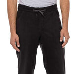 The 686 brand's Smarty 3-in-1 Cargo Pant 2023 has a black and green colorway with cargo pockets on both legs.