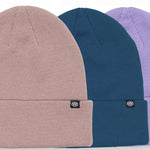 The 686 Standard Roll Up Beanie 3-Pack 2024 is depicted in a front view with three different colors including light pink, dark blue and lavender.
