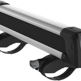 Thule Snowpack M 4 Pairs - 7324 is a black roof rack with silver accents and four gray straps.