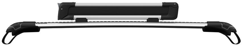 Thule Snowpack M 4 Pairs - This image shows a black and silver roof rack with four pairs of skis attached to it.