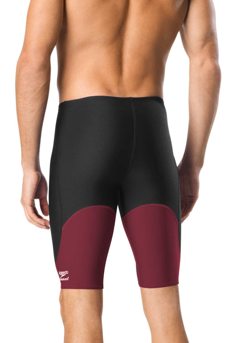 Speedo Men's Spark Splice Jammer Swimsuit - A black swimsuit with a red and white striped pattern on the sides, featuring a solid black back.