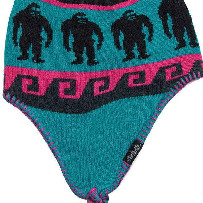 Airblaster Squatchamama Beanie 2023 - A teal beanie with a pink stripe and black yeti silhouettes.