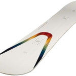 Arbor Women's Poparazzi Camber Snowboard 2023 - A white snowboard with a rainbow-colored swoosh design on top of it.
