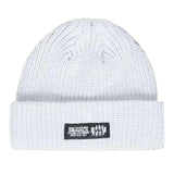 Beyond Medals Culture Beanie 2024 - A white beanie with a black rectangular patch on the front featuring illegible white text and logos.