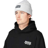 Beyond Medals Culture Beanie 2024 - A light gray beanie with a black rectangular patch on the front featuring white text that reads "BEYOND MEDALS CULTURE".
