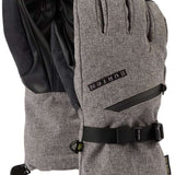 Burton Women's GORE-TEX Gloves - A pair of gloves with a black strap and buckle on the wrist, featuring a textured pattern on the palm side.