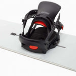Burton Women's Lexa X EST Snowboard Binding 2023 - A black and red snowboard binding with a distinctive white logo on top of the strap.