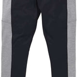 Burton Ladies Midweight X Base Layer Pant 2023 - A pair of black base layer pants with a white logo on the left hip and gray accents along the sides.
