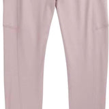 Burton Ladies Midweight X Base Layer Pant 2023 - A pair of light pink base layer pants with a small black triangle logo on the waistband.