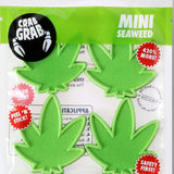 Crab Grab Mini Seaweed Stomp Pad 2023 - Green seaweed-shaped pad with a textured surface and three small suction cups on the bottom.