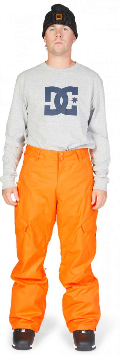 DC Banshee Insulated Pant 2023 - A pair of bright orange snow pants with a black logo on the left thigh and a zippered pocket on the right hip.