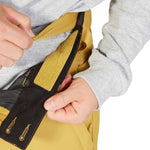 DC Banshee Insulated Pant - Black insulated snowboard pants with yellow accents on the side and a black zipper.