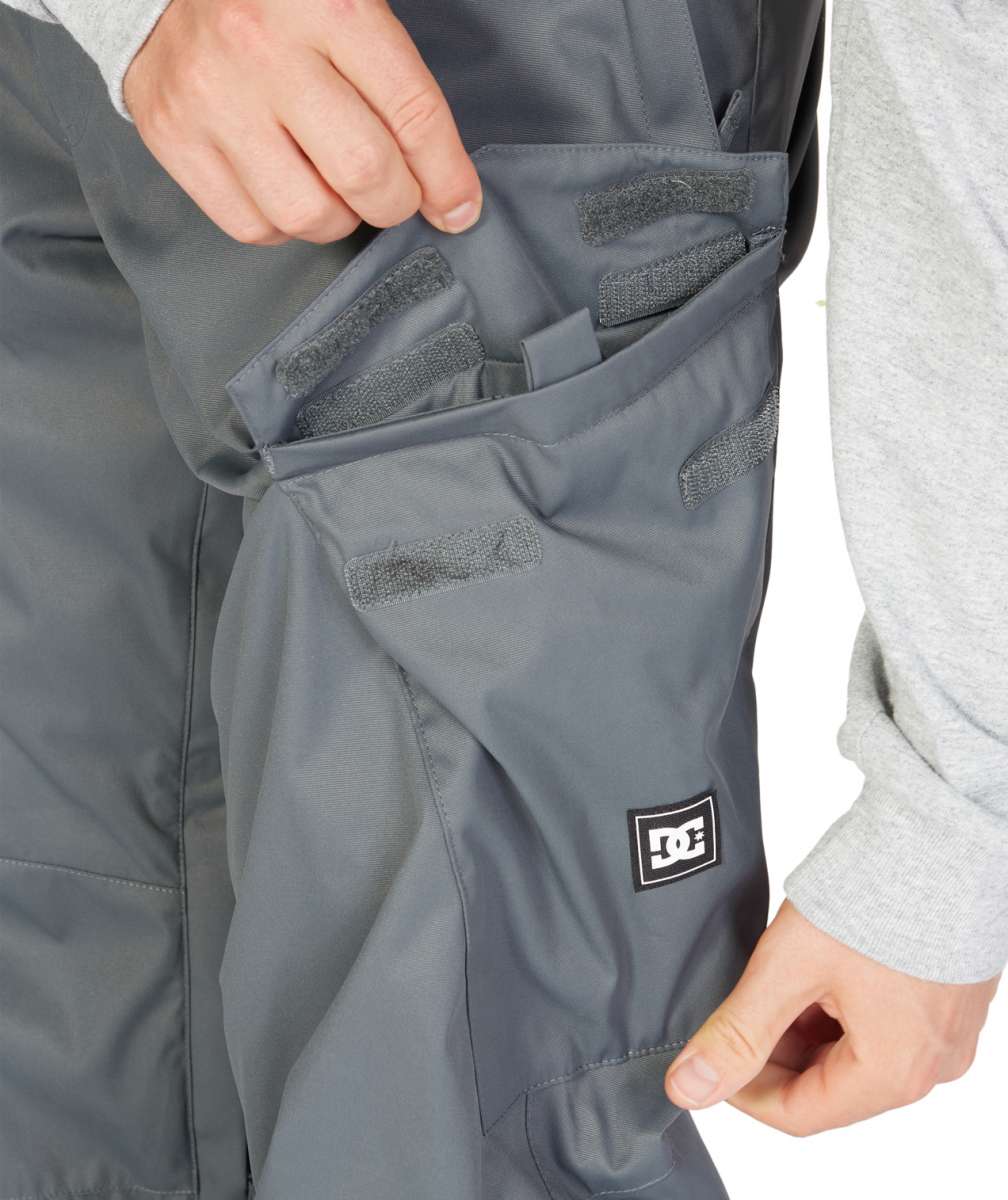 DC Banshee Insulated Pant 2023 - A pair of gray snowboard pants with a black logo patch on the lower right leg.