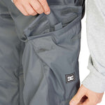 DC Banshee Insulated Pant 2023 - A pair of gray snowboard pants with a black logo patch on the lower right leg.