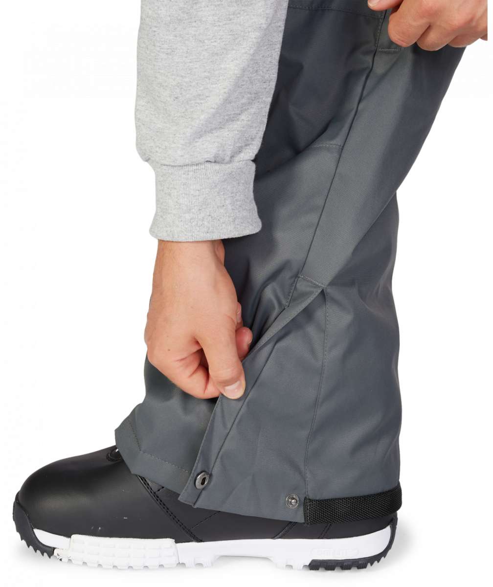 DC Banshee Insulated Pant 2023 - Black insulated snowboard pants with a subtle white stripe on the side of each leg.