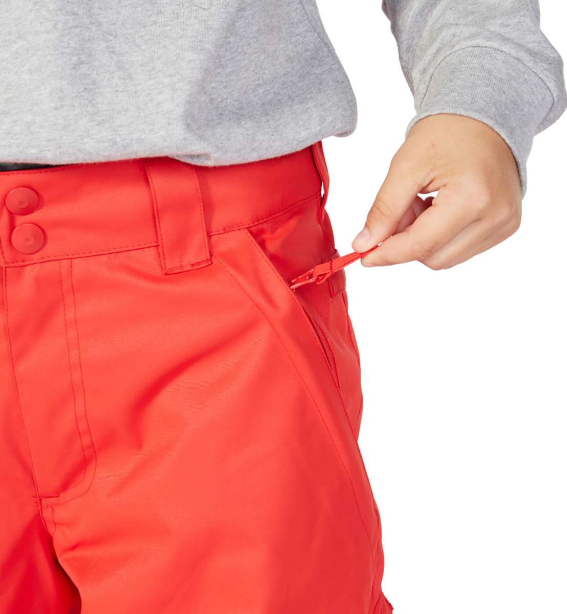 DC Junior's Banshee Insulated Pant 2023 - A pair of red snow pants with a zippered pocket on the side.
