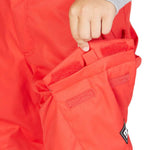 DC Junior's Banshee Insulated Pant - A pair of red snow pants with a black and white logo on the left leg.