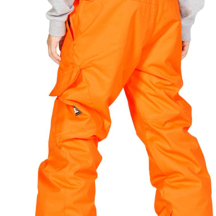 DC Junior's Banshee Insulated Pant - Pant is bright orange with a black zipper and white stitching on the side pockets.