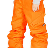 DC Junior's Banshee Insulated Pant 2023 - Bright orange snow pants with zippered pockets and adjustable cuffs.