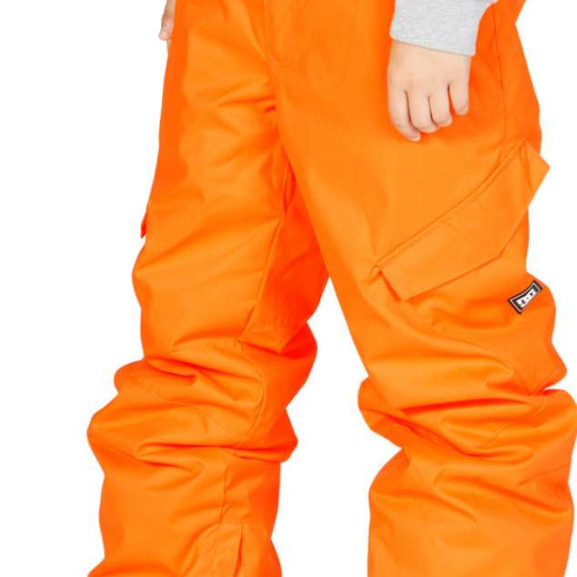 DC Junior's Banshee Insulated Pant 2023 - Bright orange snow pants with zippered pockets and adjustable cuffs.