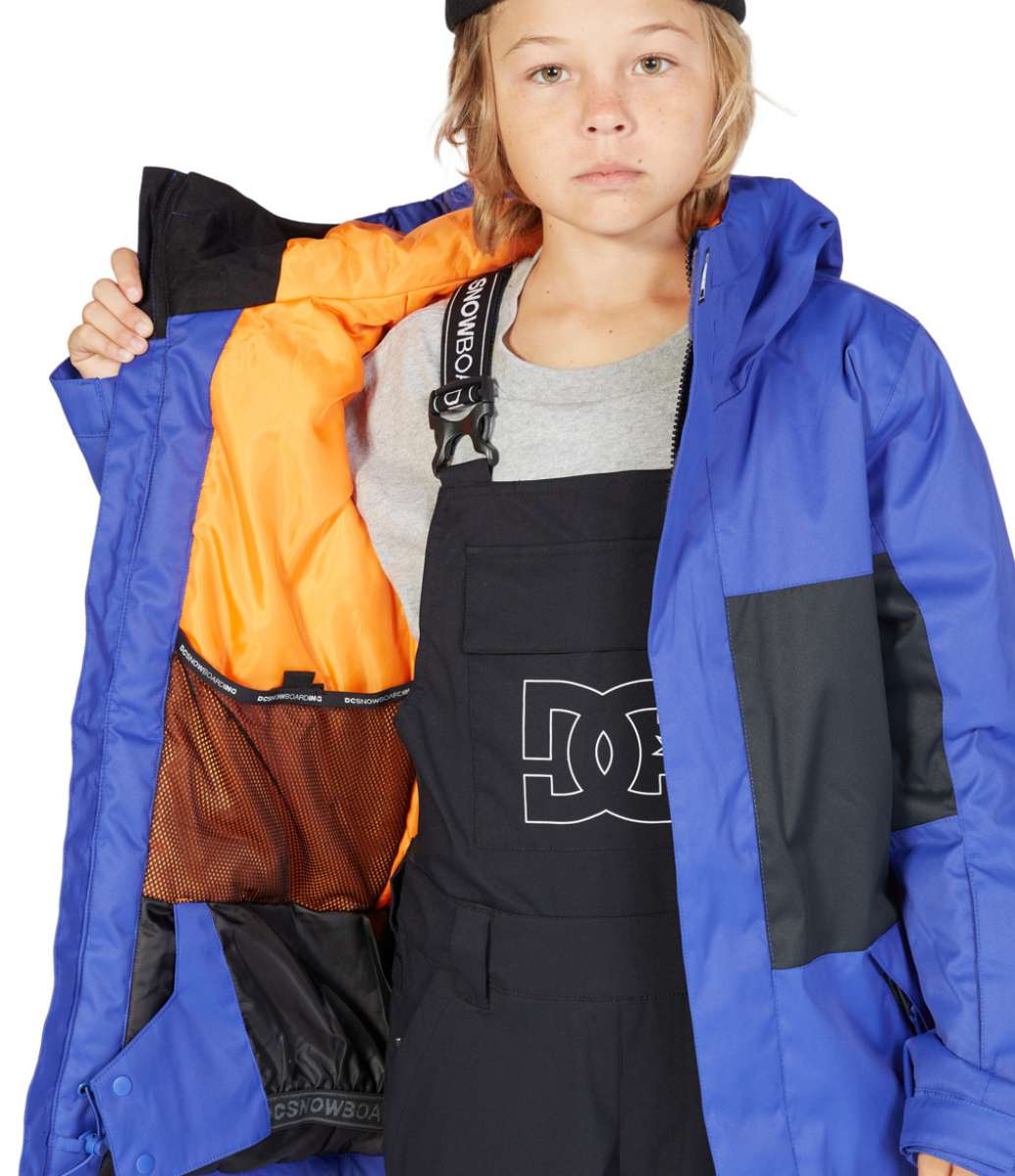 DC Junior's Defy Insulated Jacket - A royal blue jacket with a black zipper and white logo on the chest.