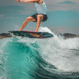 Hyperlite Time Machine Limited Edition Wakesurf Board 2022 - A blue and black board with a white logo on top, featuring a distinctive design.