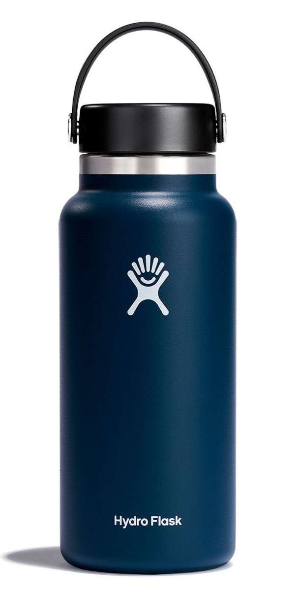 Hydro Flask 32oz Wide Mouth Water Bottle - A dark blue water bottle with a black lid and handle, featuring a white logo on the front.