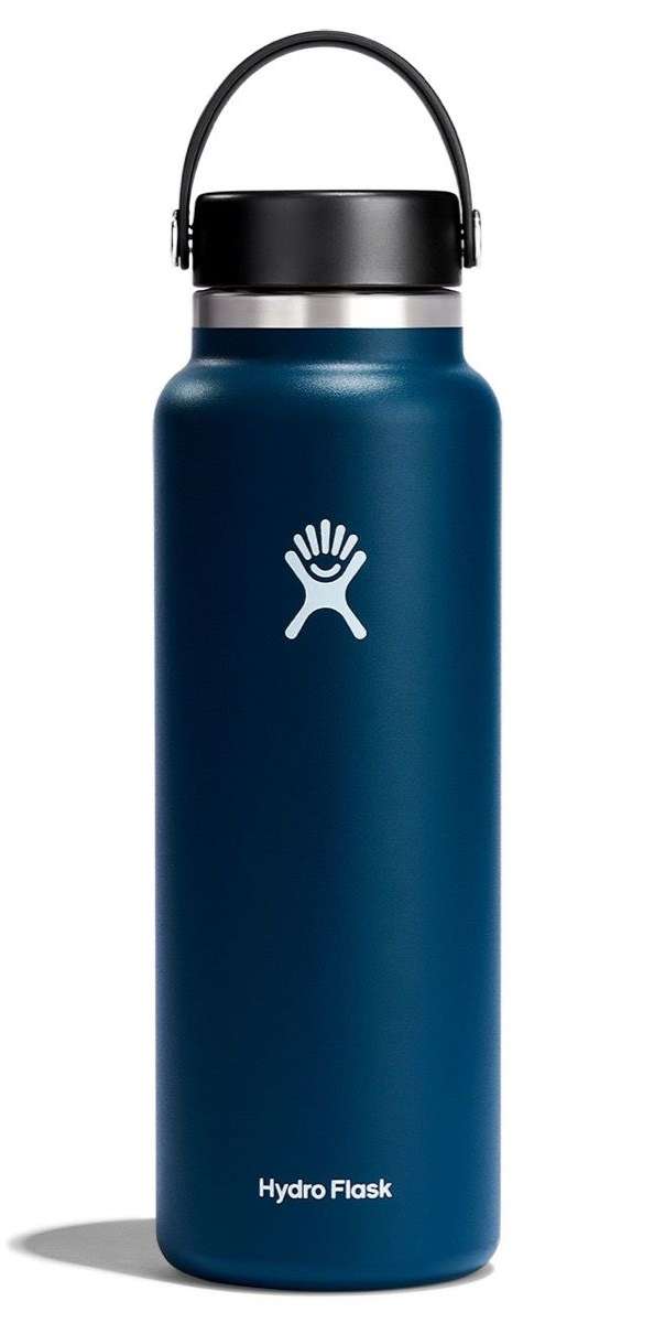 Hydro Flask - A dark blue water bottle with a black lid, featuring a wide mouth opening and a handle on top.