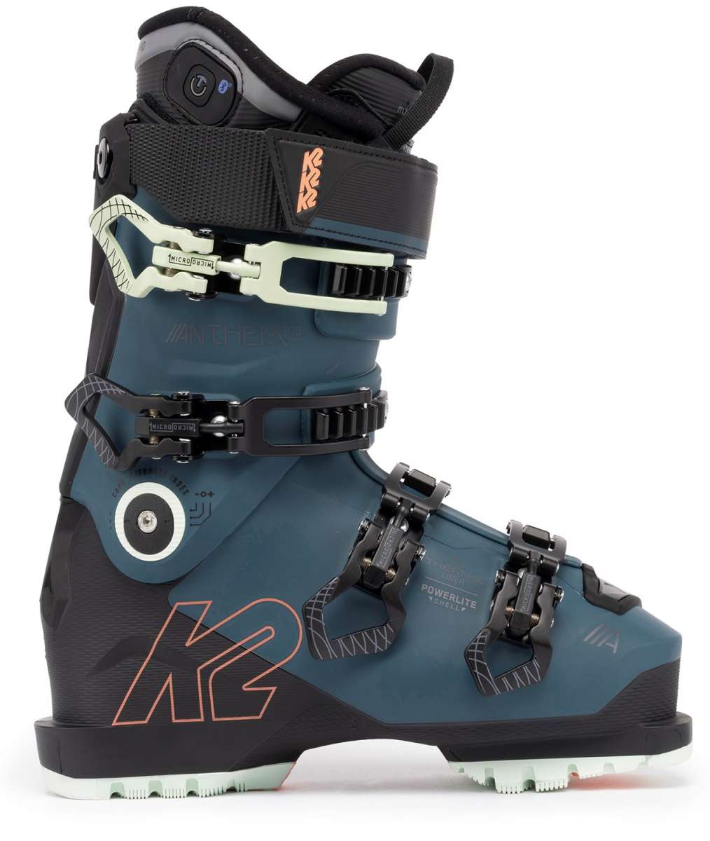 K2 Anthem 105 MV Heat women’s ski boot features a red and teal color scheme with a distinctive design.