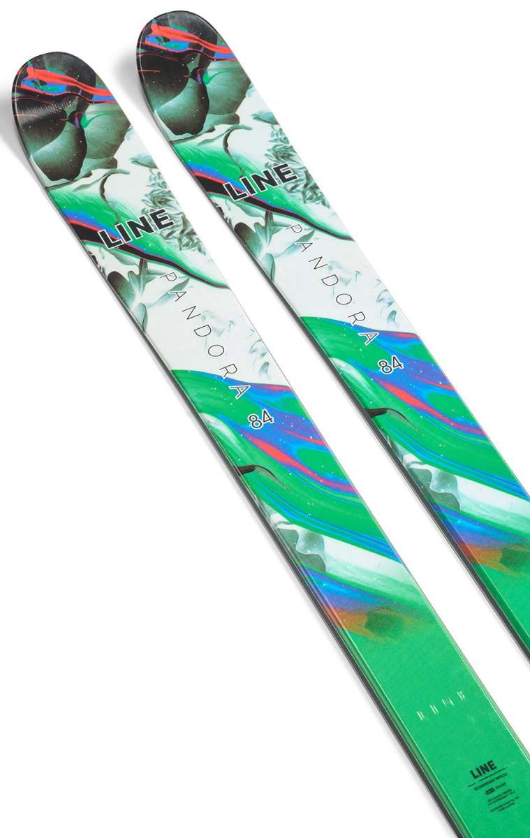 Line Women's Pandora 84 Skis 2024 - White skis with green and blue abstract design on top, black bindings at tip and tail.