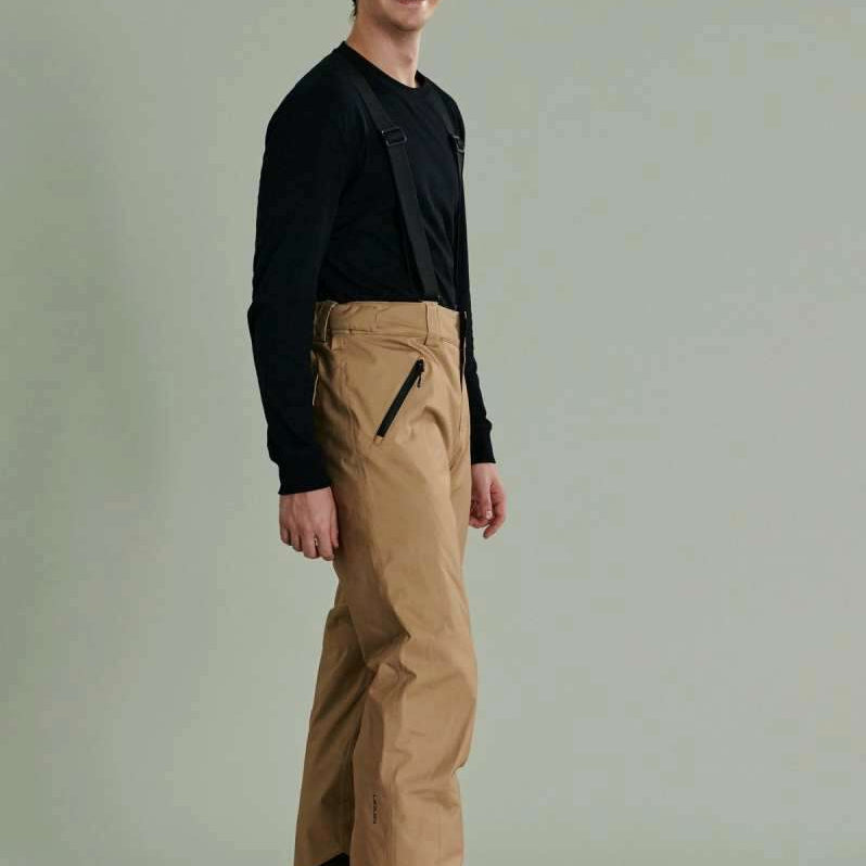 Liquid Cave Insulated Suspender Pant - Black insulated snow pants with adjustable suspenders and zippered pockets.