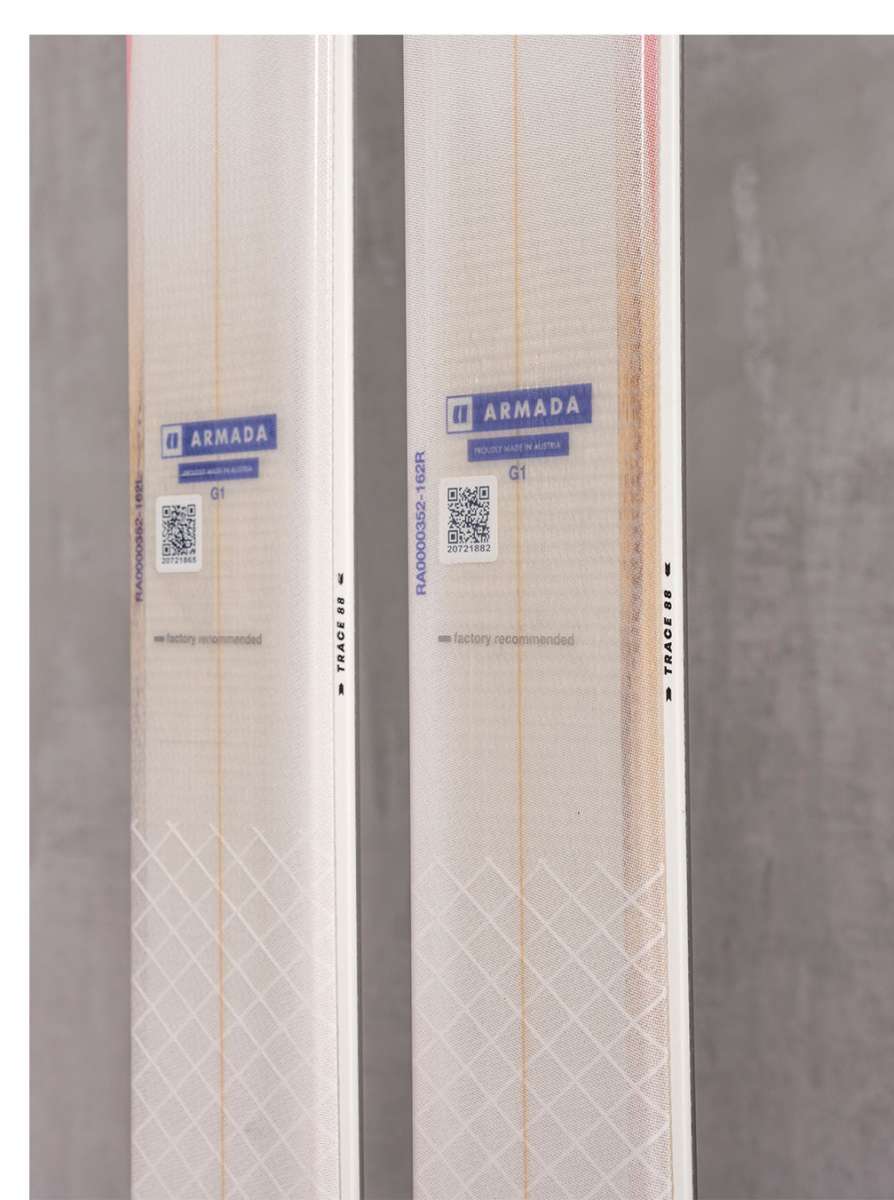 Armada Women's Trace 88 Skis 2022 - White skis with a diamond pattern on the tip and tail, featuring a blue Armada logo.