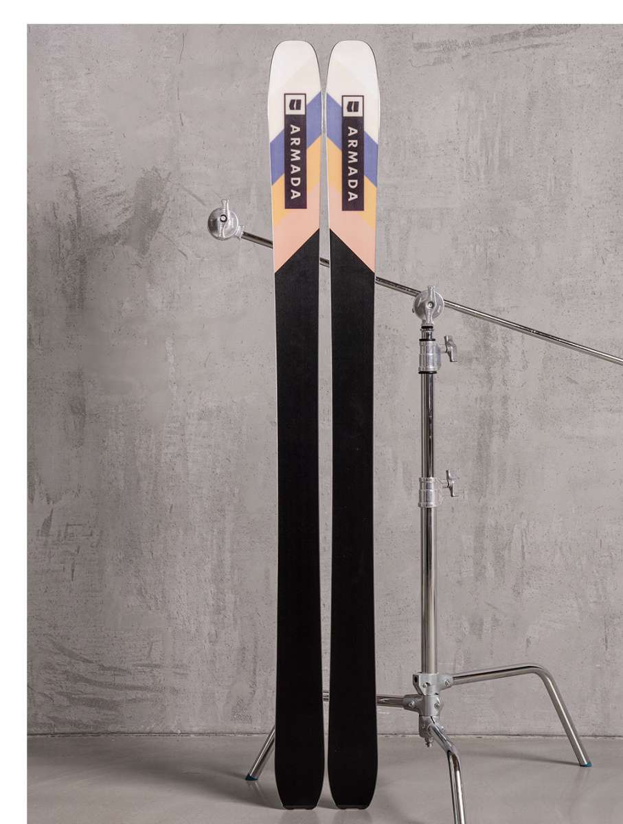 Armada Women's Trace 88 Skis 2022 - A pair of skis with a white top and blue, yellow, and pink geometric pattern on the tip.