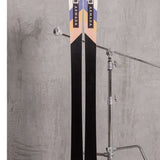 Armada Women's Trace 88 Skis 2022 - A pair of skis with a white top and blue, yellow, and pink geometric pattern on the tip.