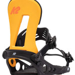 The image shows a pair of yellow and black K2 Line Up Snowboarding Bindings for the year 2022. These bindings are designed to securely attach to snowboards, providing support and control during snowboarding activities. The bindings feature a sturdy design with adjustable straps and buckles for a comfortable fit, as well as a heel release mechanism that allows for easy removal from the snowboard. The K2 logo is prominently displayed on the bindings, indicating the brand of the product.