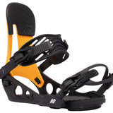 The image shows a pair of K2 Line Up snowboarding bindings for the year 2022. The bindings are black and yellow, with a sturdy design featuring multiple straps and buckles for secure attachment to boots.