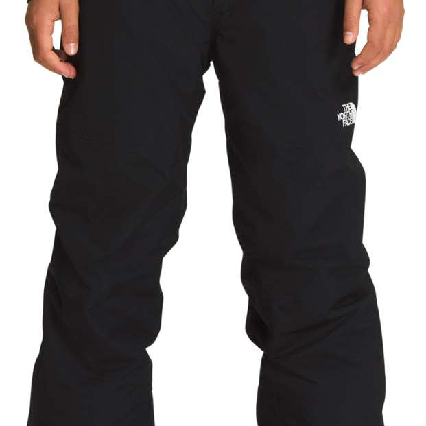 North Face Boys Freedom Insulated Pant 2024 - Black pants with white logo on left leg.