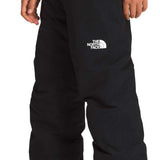 North Face Boys Freedom Insulated Pant 2024 - Black pants with white logo on left leg.