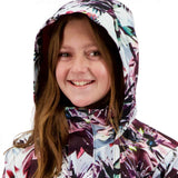 Obermeyer Girls Taja Print Insulated Jacket 2022 - A white jacket with a purple and pink floral pattern, featuring a hood and zipper closure.