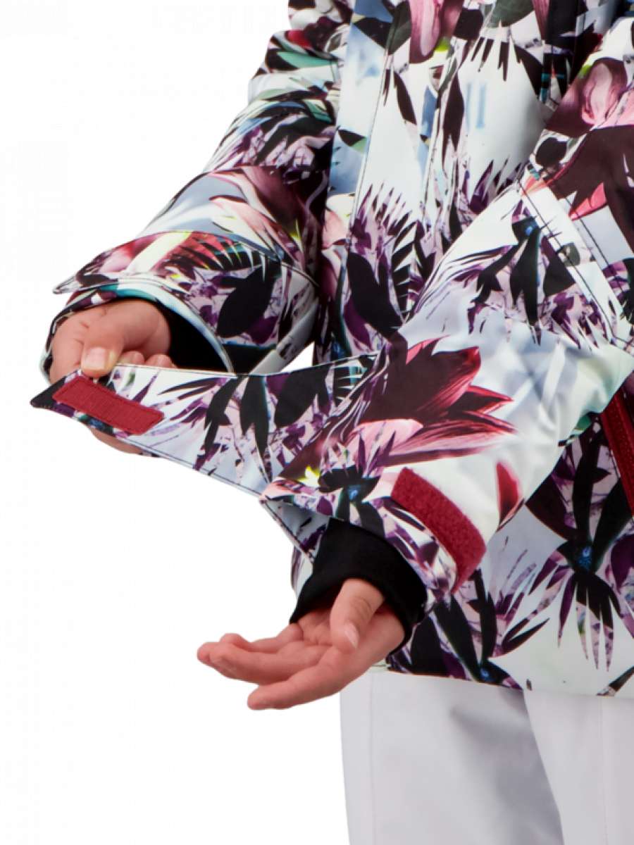 Obermeyer Girls Taja Print Insulated Jacket 2022 - A white jacket with a colorful floral pattern featuring pink, purple, and green flowers.