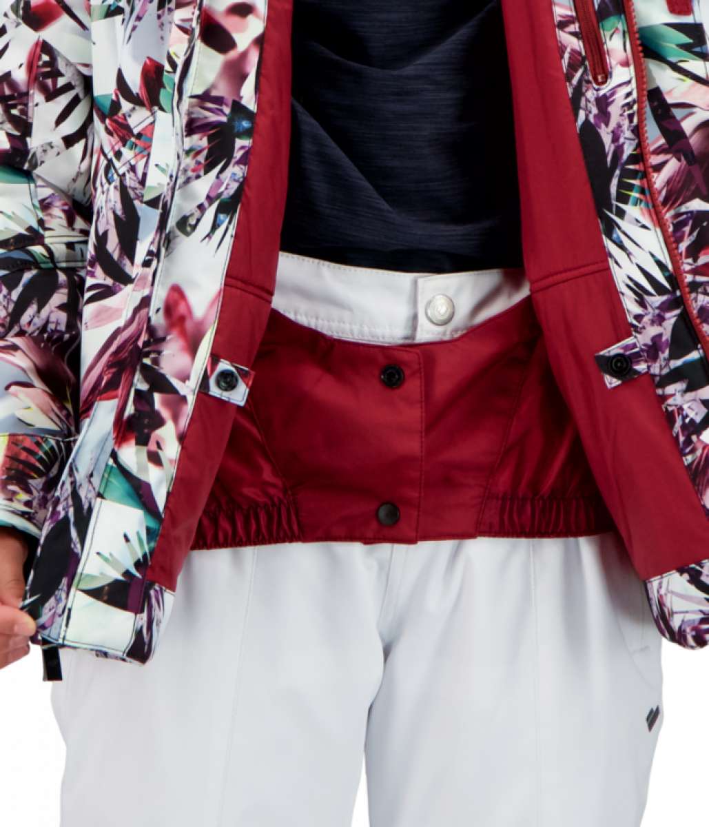 Obermeyer Girls Taja Print Insulated Jacket 2022 - A white jacket with a colorful floral pattern and black buttons down the front.