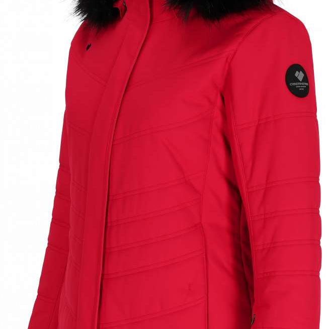 Obermeyer Women's Tuscany II Down Jacket 2024 - A red down jacket with a black fur-lined hood and two zippered pockets on either side.