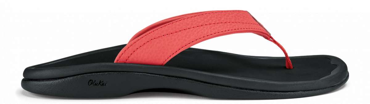 Olukai Women's Ohana Sandals 2022 - A pair of coral-colored sandals with a woven strap design and a small logo on the side.