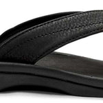 Olukai Women's Ohana Sandals 2022 - A pair of black sandals with a strap across the foot and a small logo on the side.