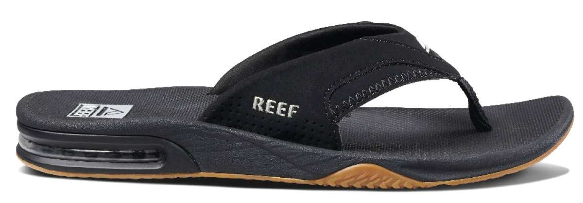Reef Men's Fanning Sandal - A black sandal with a white logo on the strap and a brown sole.