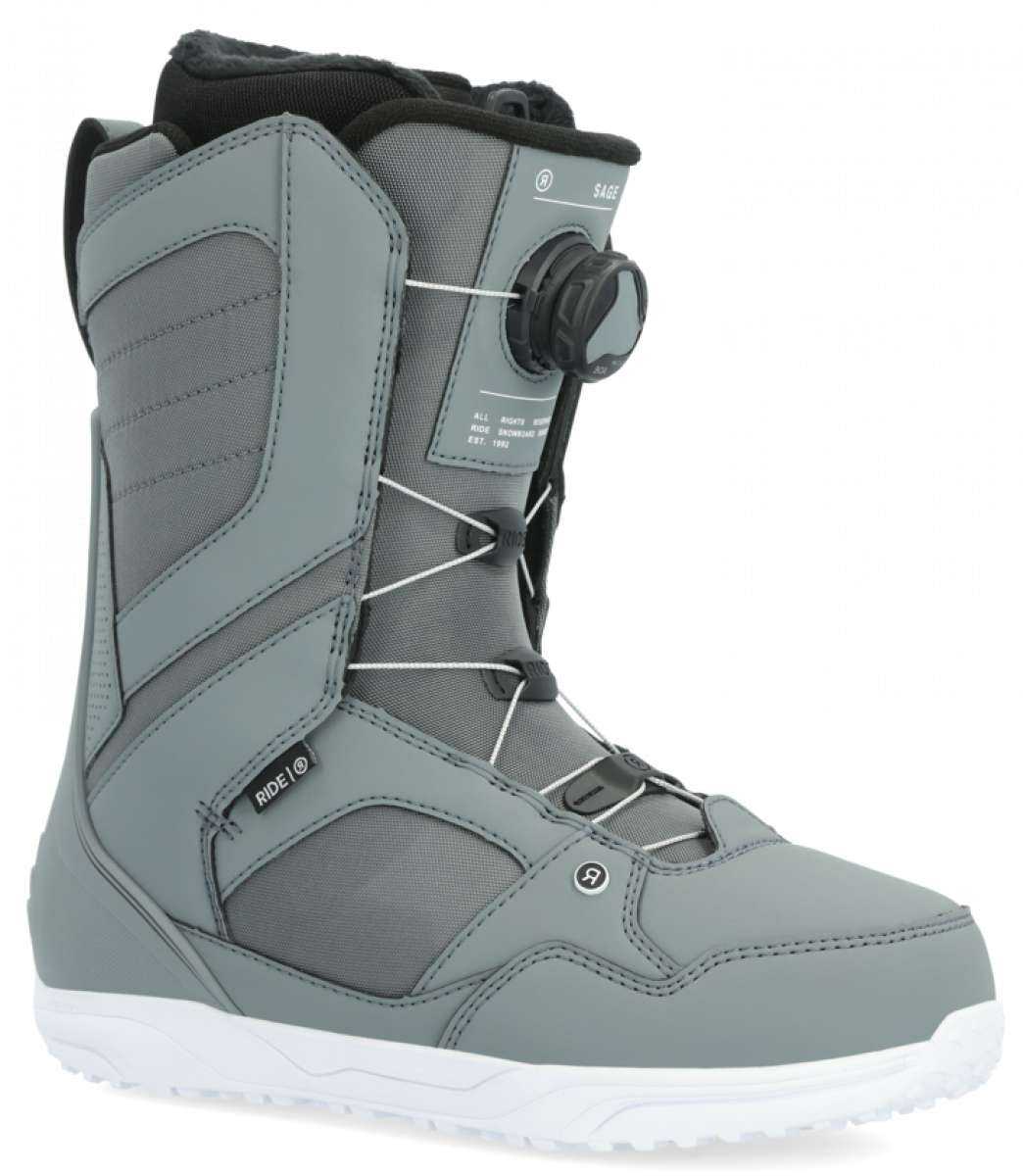 Ride Women's Sage Snowboard Boot 2024 - A gray snowboard boot with a black strap and white laces.