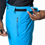 Rossignol Rapide Insulated Pant 2022-2023 - A pair of bright blue snow pants with a black waistband and two black snap buttons on each side.
